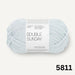 Beige knitted Sille Slipover Mini vest for children from PetiteKnit x Sandnes Garn Double Sunday knitting kit