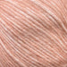 Luxuriously soft yarn for Simple Triangle Shawl Knit Kit, featuring Chaska Wara DK/8ply in a peach hue, ideal for cozy and stylish knit projects.