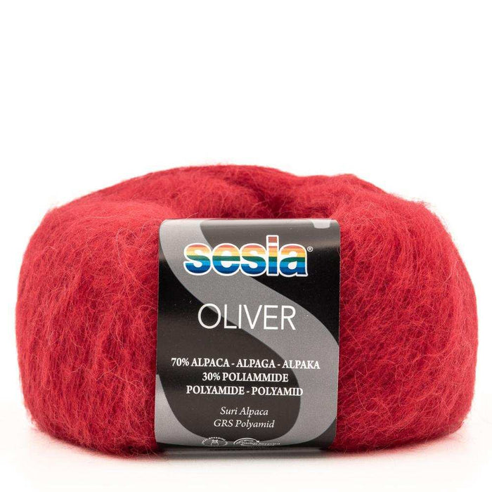 Sesia Oliver yarn ball in red, ideal for the Sophie Scarf Knit Kit featuring luxury alpaca blend.