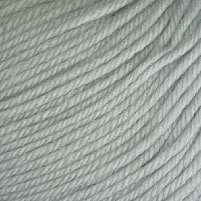 12-ply New Zealand Merino wool yarn, light color, soft texture.