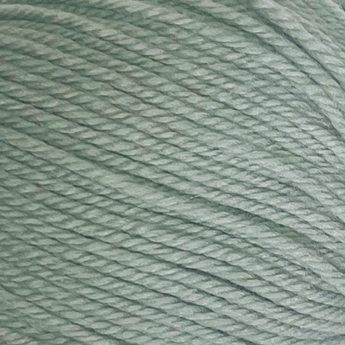 12-ply New Zealand Merino wool yarn in soft green color, ideal for crafting warm and luxurious garments.