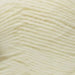 Soft ivory 4ply yarn, perfect for knitting a textured baby jacket and hat.