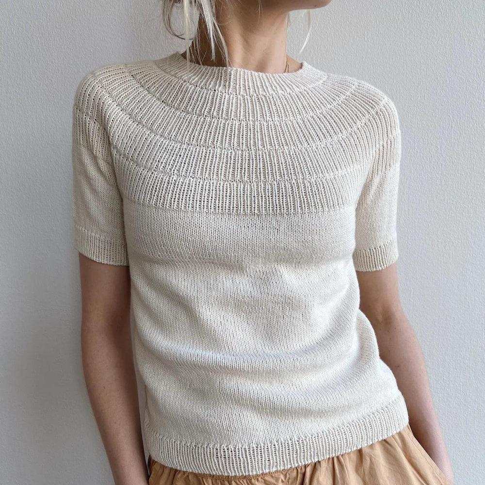 Anker’s Summer Shirt by PetiteKnit showing the ribbed yoke and short sleeves; choose your Line shade
