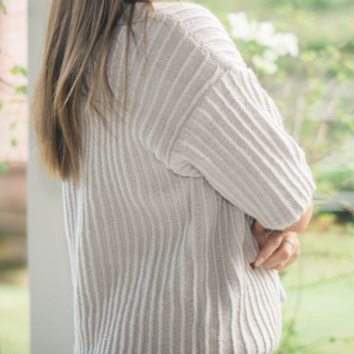 Deep V Cardigan in textured rib stitch, knitted with Crucci Aella 8ply yarn.