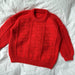 Red Esther Sweater Junior with textured pattern, suitable for ages 1-14 years, top-down knitting pattern.