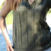 Unisex olive V-neck vest with vertical panel pattern, knitted in Touch Merino 8ply yarn.