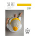 Sol Hat knitting pattern cover featuring a child wearing a stylish, yellow-topped knit hat designed for warmth with Amano Inti yarn.