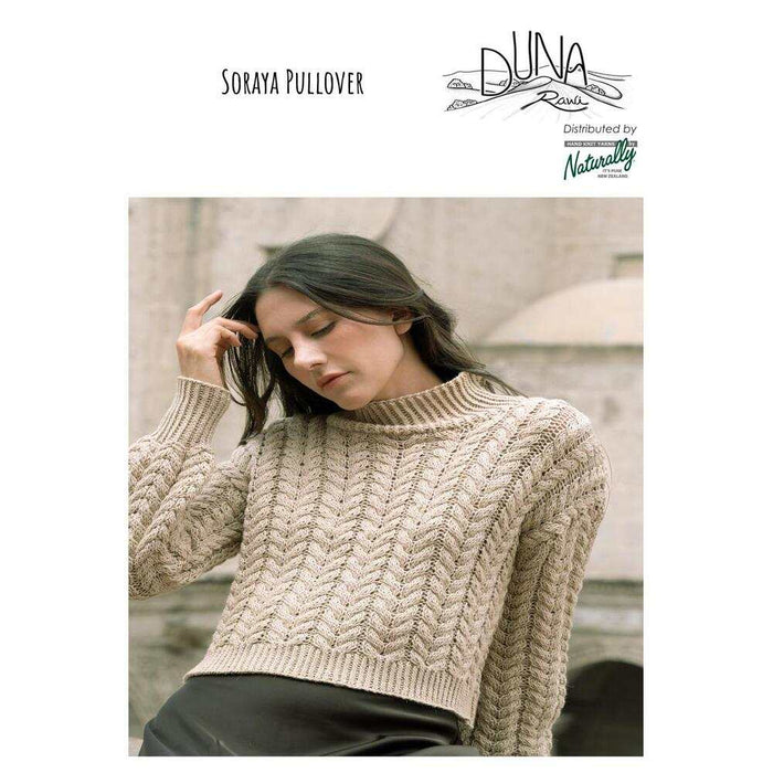 Soraya Pullover knitting pattern featuring all-over cable design and twisted-rib trims in Amano Duna Rawi yarn
