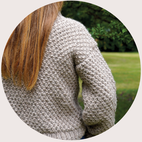 Thea Sweater women's knitted sweater with central cable panel and chunky double moss stitch in light brown wool