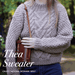 Woman wearing hand-knitted Thea Sweater in light brown Crucci Natural Wonder 18ply wool with central cable and double moss stitch texture