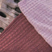 Hand-knitted baby blanket made with Crucci Baby Love 4ply Australian Merino wool yarn