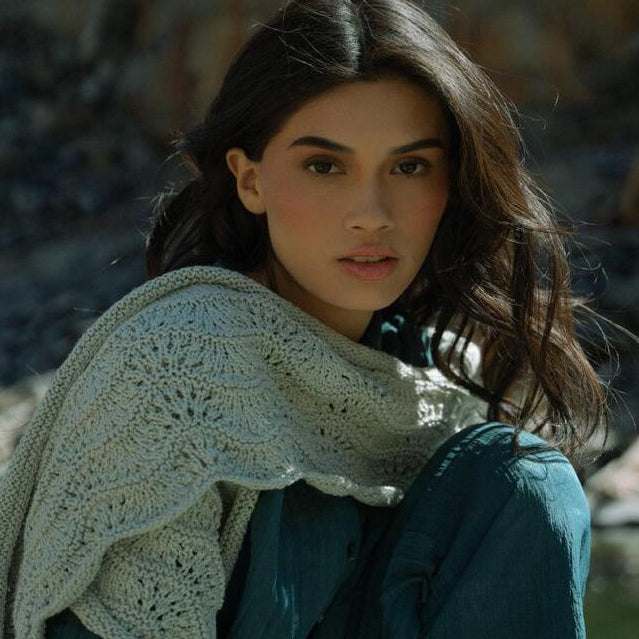 Wide crescent Urpi shawl with wave lace border and wildflower-knot texture knitting pattern