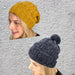 Beanie and slouch hat knitting pattern in yellow and gray designs on a textured background.