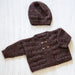 Baby cardigan and hat knitting pattern in Naturally Omana Print 4ply yarn, featuring textured stitch and button detail.