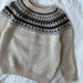 Junior Celeste Sweater with circular yoke and colorwork, from PetiteKnit knitting pattern.