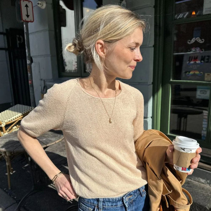 Cumulus Tee O Neck Knitting Pattern by PetiteKnit, featuring a round neck design in stockinette stitch with i-cord edges.