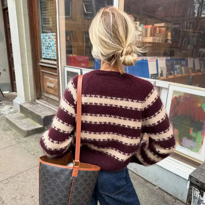 PetiteKnit Key Cardigan with two-color stranded stripe pattern, worn outdoors.