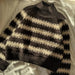 Striped Key Sweater knitting pattern by PetiteKnit, featuring top-down raglan design and ribbed edges.