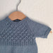 Milla's Summer Suit Knitting Pattern by PetiteKnit, vintage-inspired baby knitwear, smocking stitch, bottom-up design.