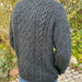 Moby Sweater Man knitting pattern by PetiteKnit in dark textured cable design.