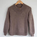 Oversized sweater knitting pattern with drop-shoulder design in Alpaca Air 12ply yarn, featuring ribbed neckline, hem, and cuffs.