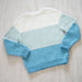 Light blue and cream raglan summer jumper for kids, knitted in Sesia Bio Sunny DK/8ply yarn.