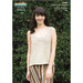 Rolled edge & garter stitch top knitting pattern N1462 with model wearing the finished knit garment against greenery.