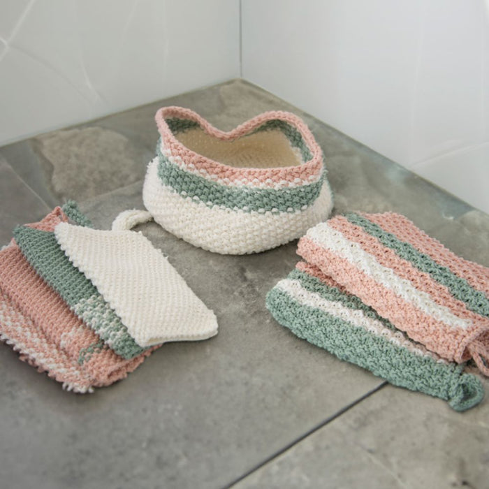Knitted storage tub and towel set with face washers in pastel colors using 10ply yarn.