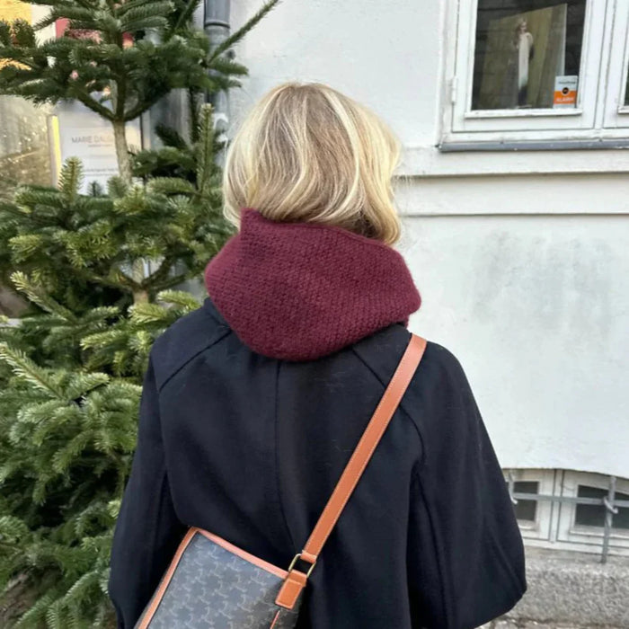 Cozy knitted hooded scarf from Sophie Hood pattern, showcasing elegant garter stitch design.