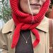 Cozy and elegant red hooded scarf from Sophie Hood knitting pattern, showcasing garter stitch with i-cord edges.