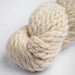 Amano Mamacha Super Chunky yarn in a soft cream color, featuring a luxurious blend of baby alpaca and merino wool for warmth and comfort.