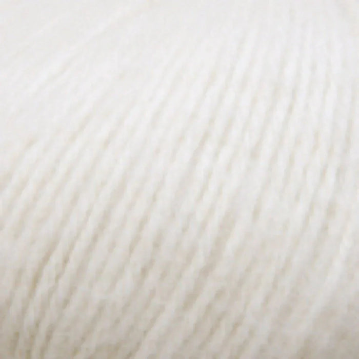 Chaska Alpaca Air 12-ply yarn in neutral shade, soft texture.