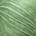 Green yarn ball used in Simple Triangle Shawl Knit Kit, featuring soft and lightweight blow yarn.