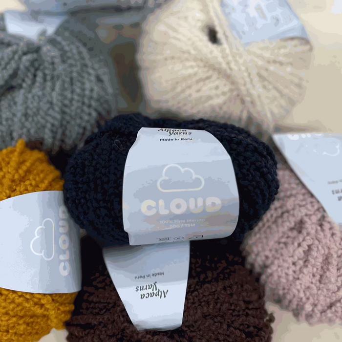 Cloud Merino 12ply Yarn in various colors, 100% Fine Merino, ideal for knitting soft textures.