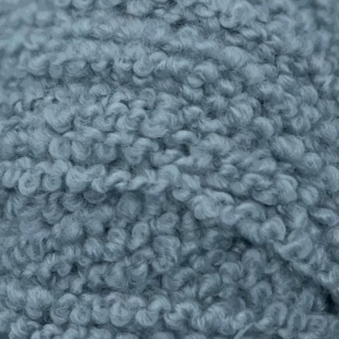 Soft textured 12ply Merino yarn in blue color.