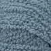 Soft textured 12ply Merino yarn in blue color.