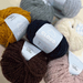 12ply Cloud Merino yarn balls in various colors, 100% Fine Merino from Peru, ideal for knitting projects.