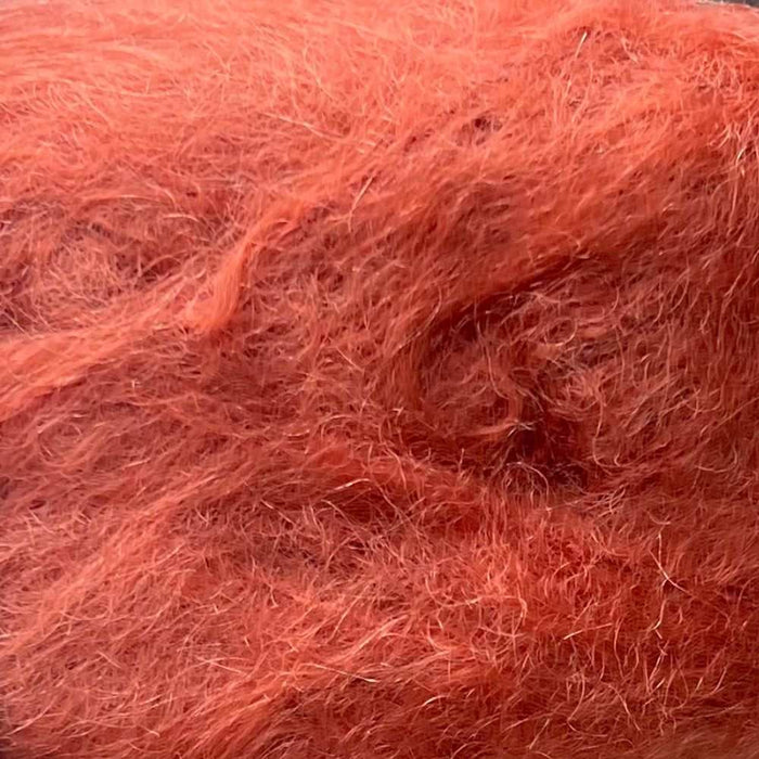 Luxurious African Expressions 12Ply Mohair Yarn in rich orange tone.