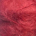 Soft red mohair yarn from African Expressions.