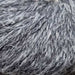 Luxurious 12-ply Naturally Moro yarn with superfine alpaca, wool, and hemp blend, showcasing a rustic, textured tweed appearance.
