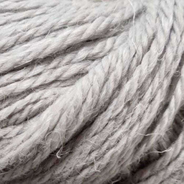 Luxurious 12-ply yarn blending superfine alpaca, wool, and hemp for natural texture and warmth.