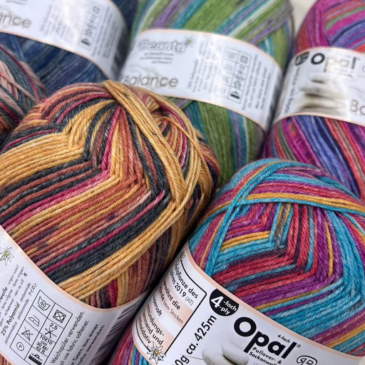 Opal Beauty Balance sock yarn in vibrant colors with Edelweiss extract, 4-ply for knitting projects.