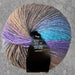 Sesia Maxxi Merino wool yarn ball in multicolor shades, ideal for cozy knitting projects.