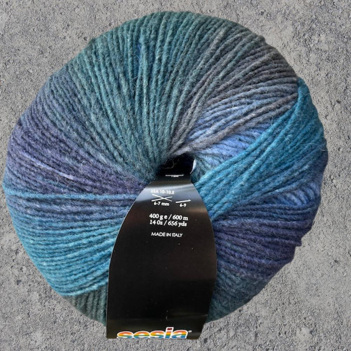Yarn ball of Sesia Maxxi, multicolored merino wool blend, 400g/600m, ideal for knitting and crocheting.