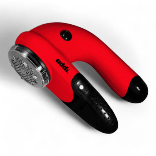 Red Addi Lint Remover for wool garments, designed to gently remove lint, pills, and fuzz while promoting sustainable fashion care.
