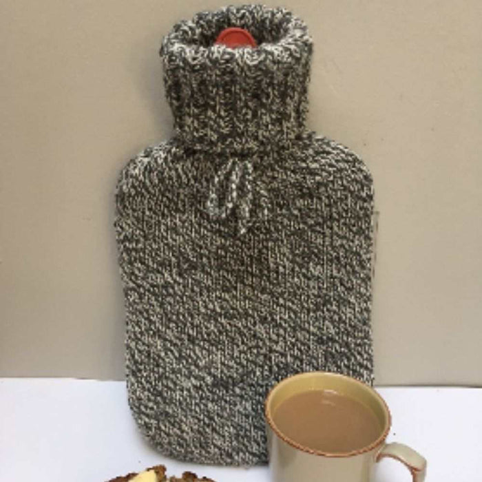 Hand-knitted Hot Stuff hot water bottle cover in marled 10 ply yarn