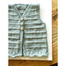 Close-up of the pale green vest's buttons, textured stripes and lace edge — Liberty Vest and Hat, Lisa F BC153.
