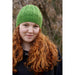 Close-up of the green beanie's geometric knit-and-purl texture — Green Hat, Lisa F HC52.