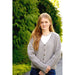 Model wearing a grey V-neck cardigan with textured sleeves — Gretchen Cardigan, Lisa F HC72.