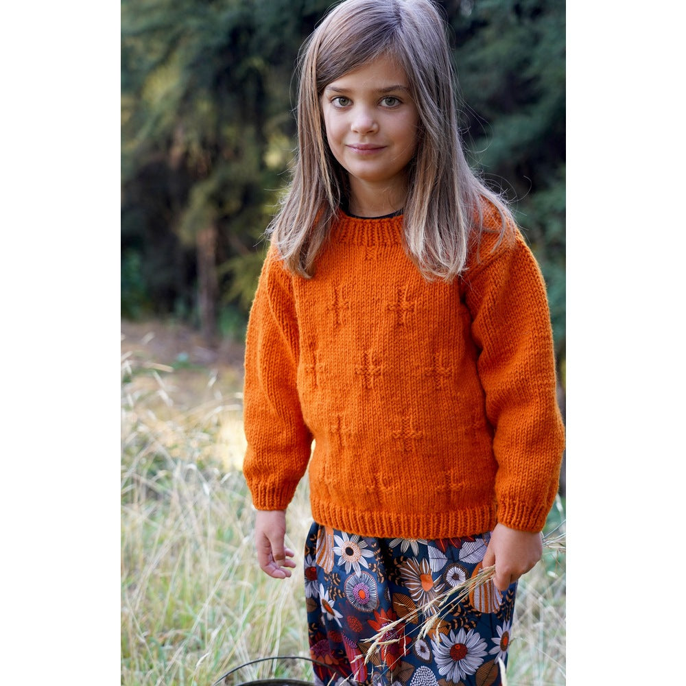 Front view of the orange sweater's textured body and plain sleeves — Ginger Sweater, Lisa F LF60.